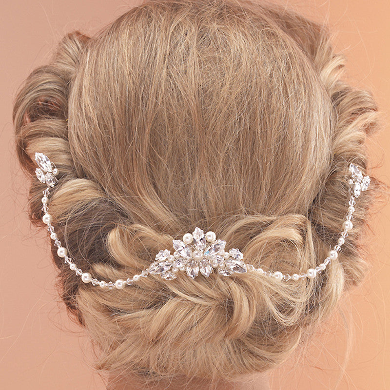 Elegant vintage style diamante & crystal hair comb with 2 crystal drapes. Perfect for a vintage bridal look or and elegant evening up do.