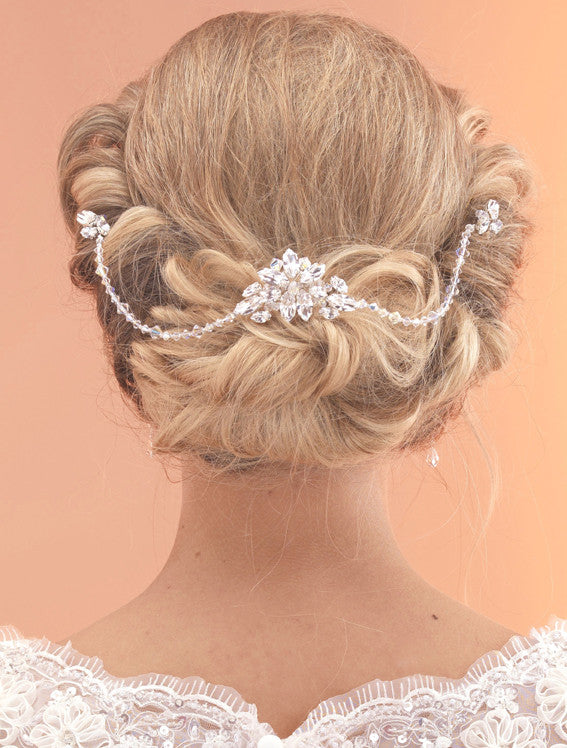 Elegant vintage style diamante & crystal hair comb with 2 crystal drapes. Perfect for a vintage bridal look or and elegant evening up do.