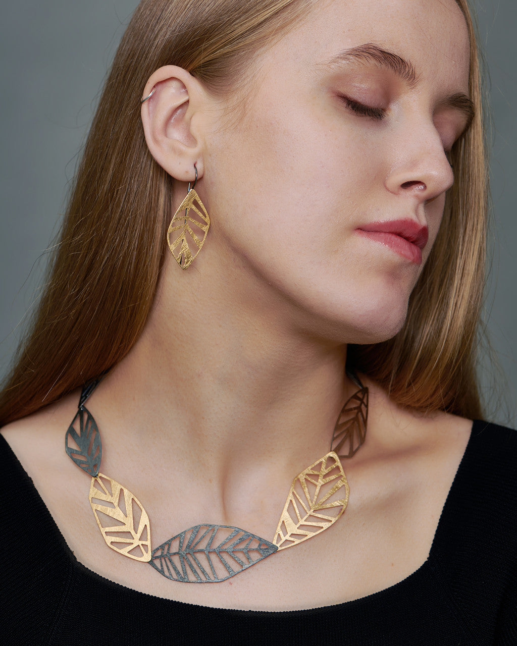 echo_deco_oxidised_sterling_silver_and_gold_geometric_leaf_necklace_and_earrings