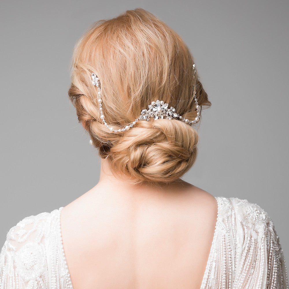 Elegant vintage style diamante & crystal hair comb with 2 crystal drapes. Perfect for a vintage bridal look or and elegant evening up do.