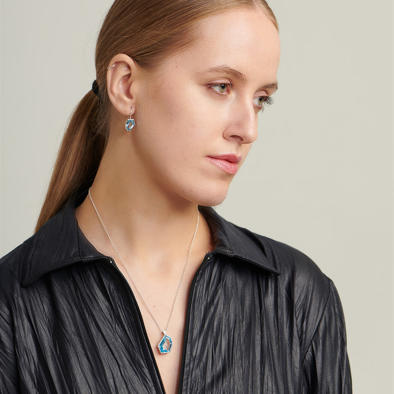 Blue topaz geometric pendant necklace