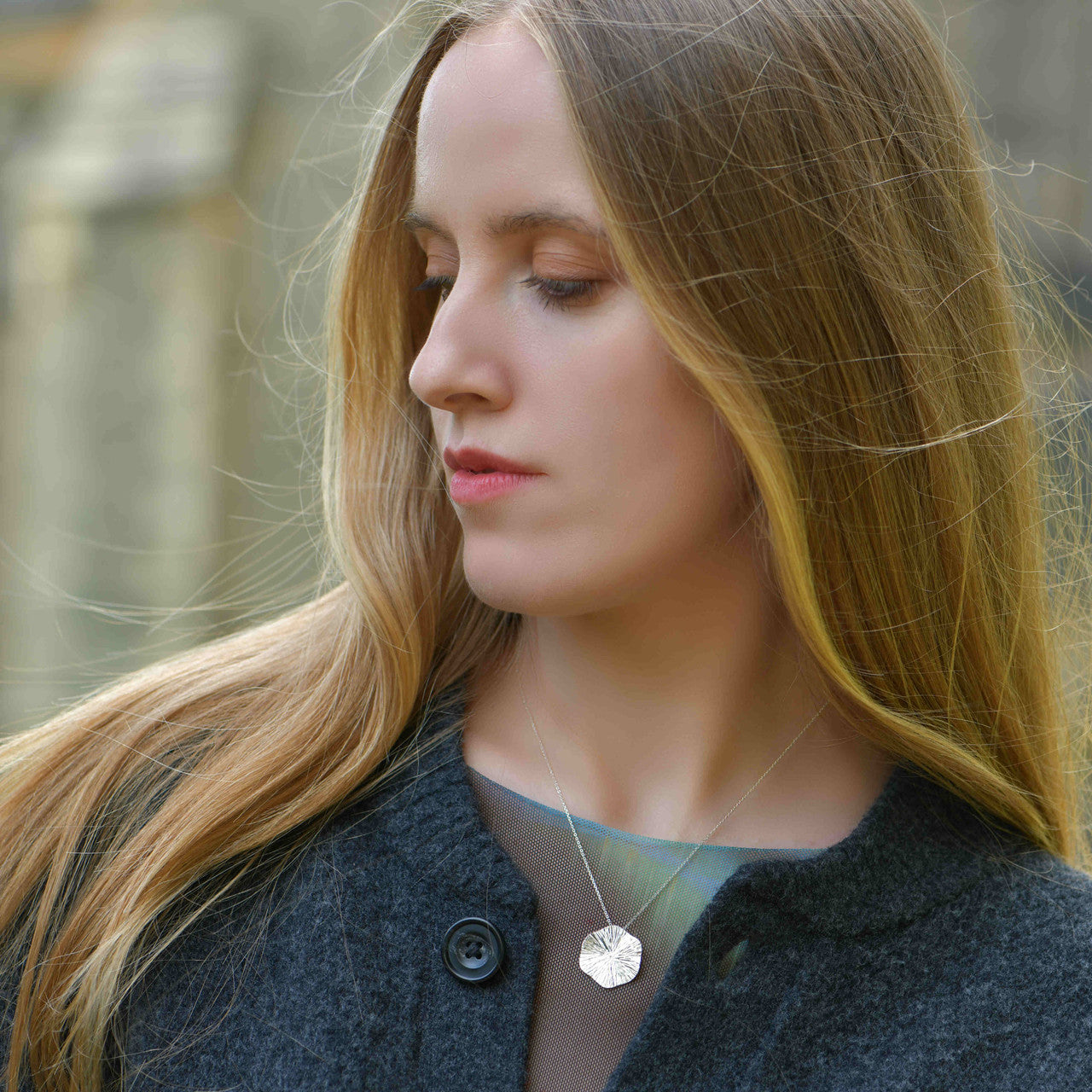 Tina_Kotsoni_handmade_jewellery_necklace_pendant_sterling_silver_disc_textured_shiny_Greece