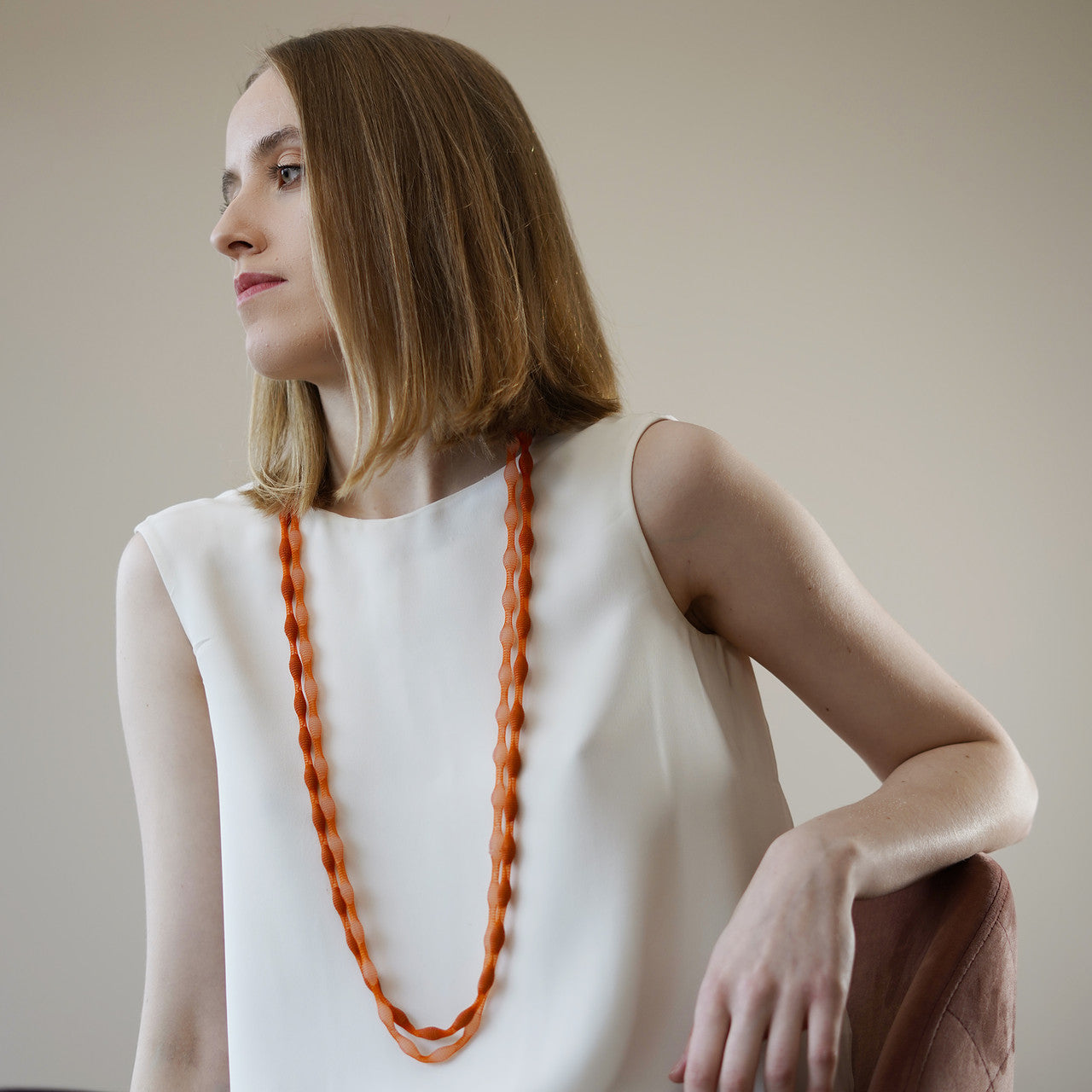 Tzuri_Gueta_handmade_jewellery_necklace_long_silicone_viscose_organic_looking_orange_transparent_Paris_France_statement_bright_eye_catching